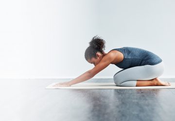 a woman in a yoga pose