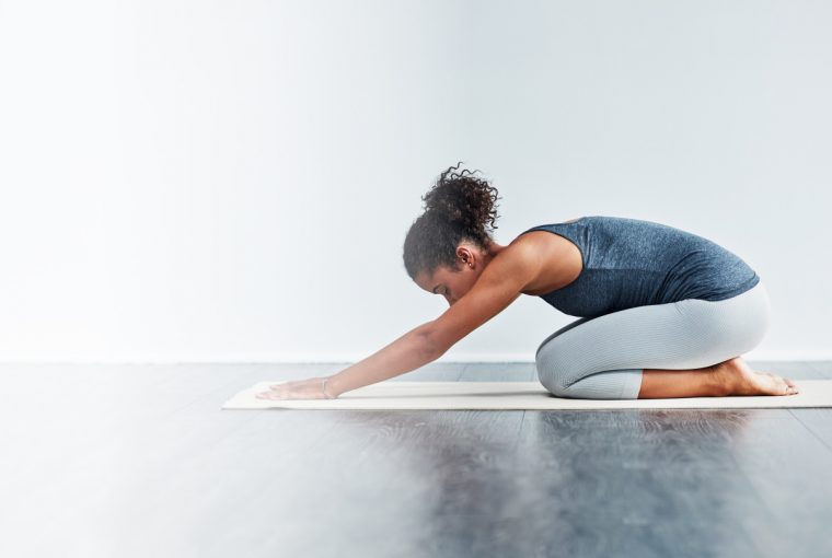 a woman in a yoga pose