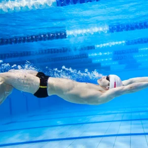 a man swimming under water