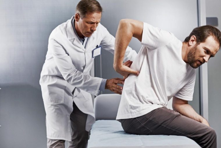 a doctor working with their patient