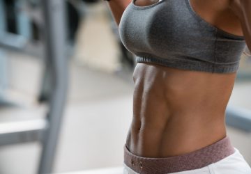 a woman with a toned stomach