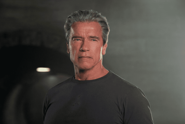 arnold schwarzeneger training his arms