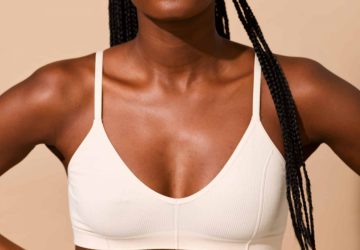 a woman wearing a white sports bra