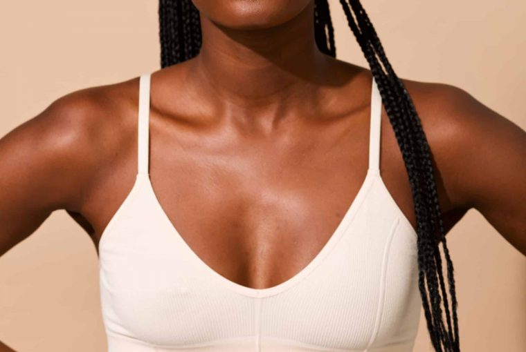 a woman wearing a white sports bra