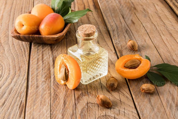 an assortment of apricots and skin oils