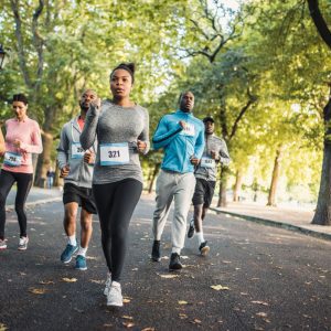 a group of runners training in a park
