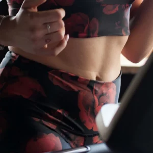 a woman running on a treadmill