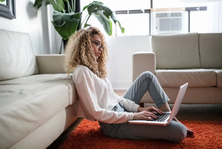 a woman doing work on her computer from home