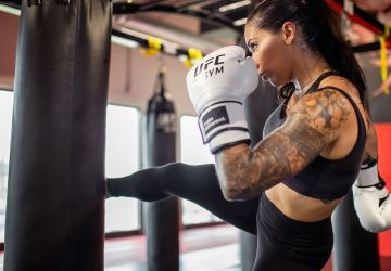 a woman training in MMA style