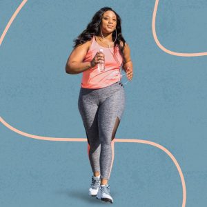 a woman walking outdoors against an animated background