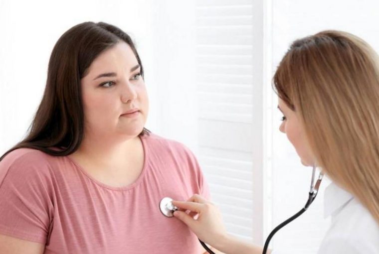 a woman having her heart checked