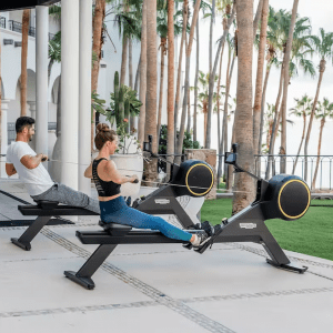 a couple working outdoors in a resort space