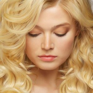 a woman with blonde hair extensions