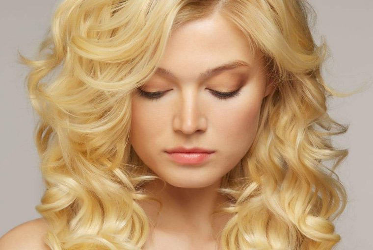 a woman with blonde hair extensions