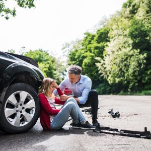 a woman receiving medical attention after a car accident