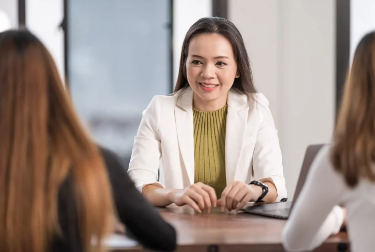a woman counseling a couple