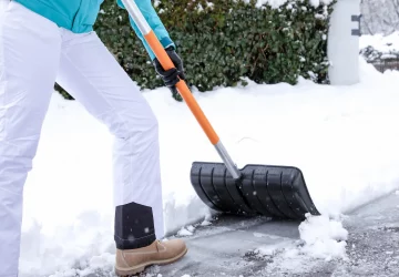 a person shoveling snow
