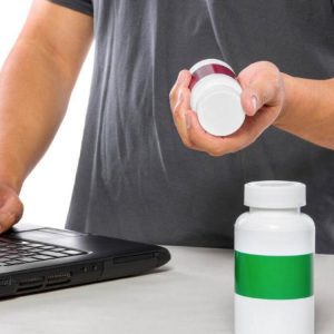 a man ordering supplements online