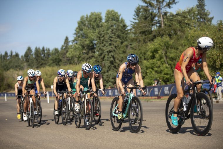 a group of cyclists outside