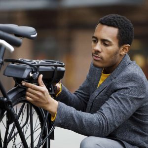 a man checking out their ebike