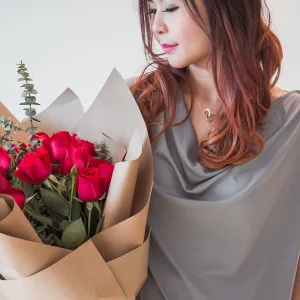 a woman with a boquet