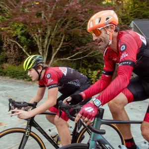 2 people cycling with a helmet