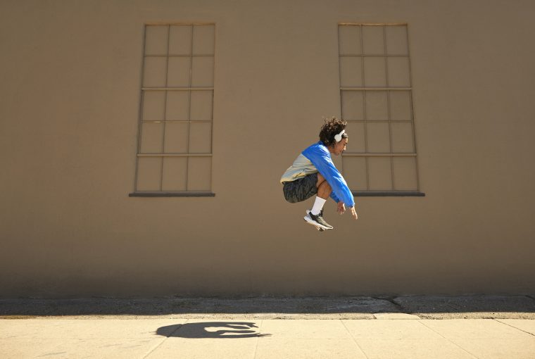 a woman doing squat jumps