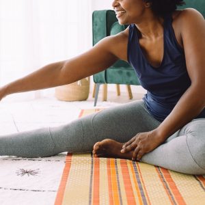 a woman stretching on the floor