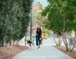 a woman walking with her dog