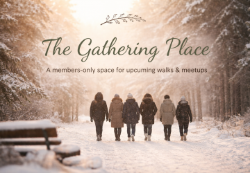 a group of people walking in a snowy street