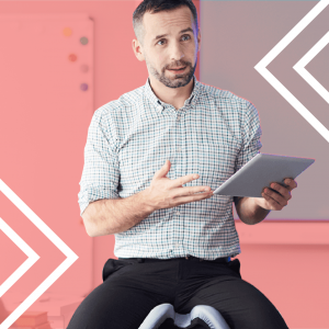 an instructor holding a tablet