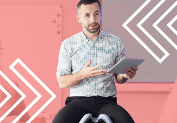 an instructor holding a tablet