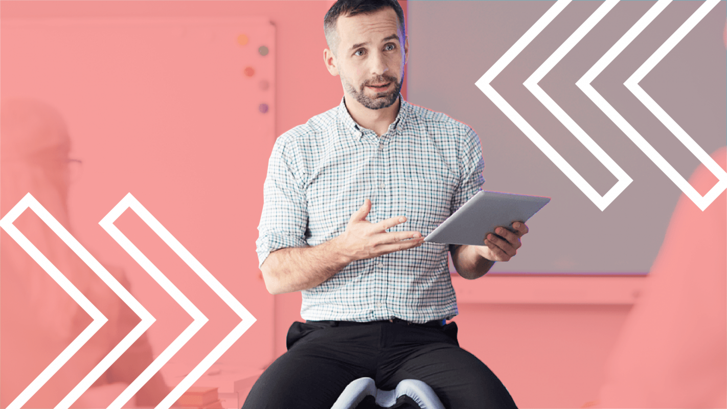 an instructor holding a tablet
