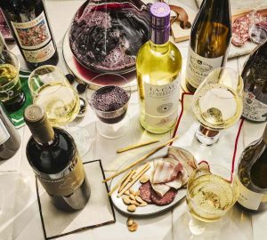 an assortment of wines on a table