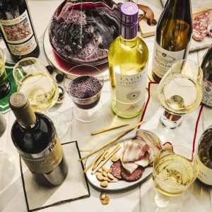 an assortment of wines on a table