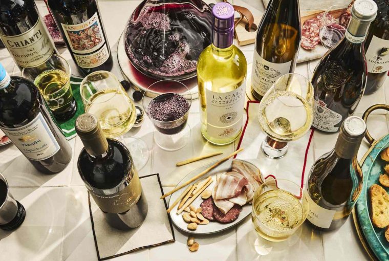 an assortment of wines on a table