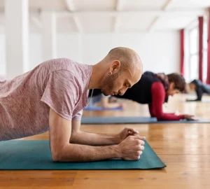 a pair doing a plank exercise