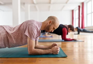 a pair doing a plank exercise