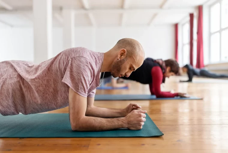a pair doing a plank exercise