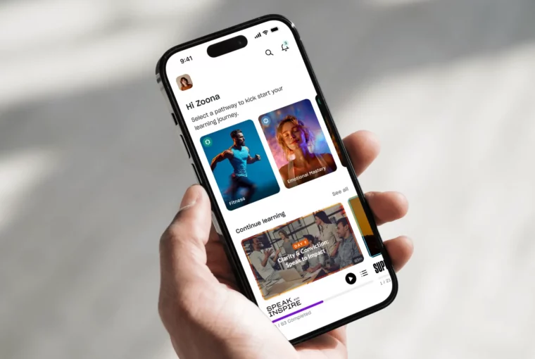 a person holding their phone with an app open