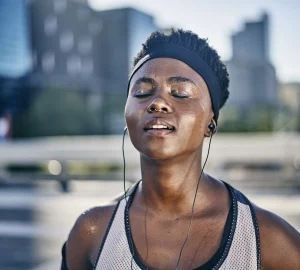 a woman outdoors sweating