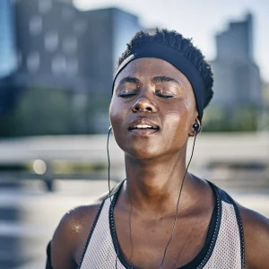 a woman outdoors sweating