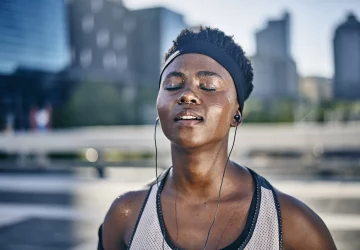a woman outdoors sweating