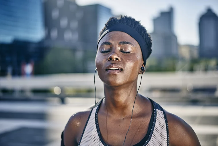 a woman outdoors sweating