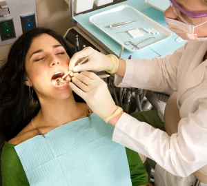 a woman receiving dental care