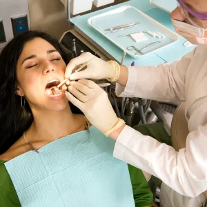 a woman receiving dental care