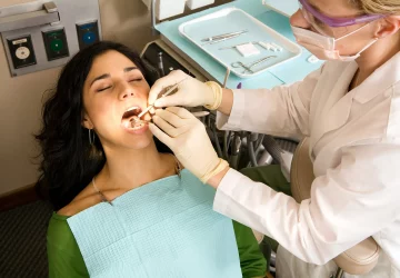 a woman receiving dental care