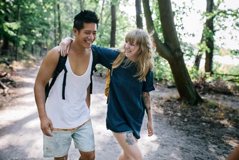 a couple friends hiking outdoors