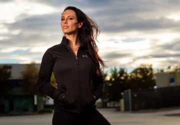 a woman standin goutdoors