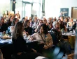 a group of women in a conference